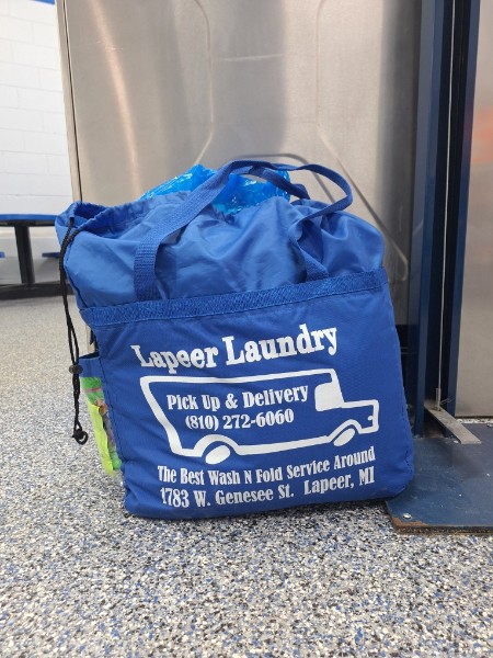 Lapeer Laundry branded laundry bag for pickup and delivery
